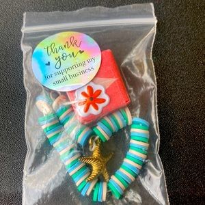 One sticker star charm teal green tan light blue one peace of candy